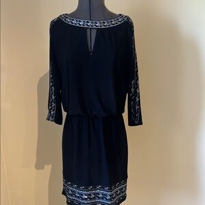 Elegant Black Dress with White Accents